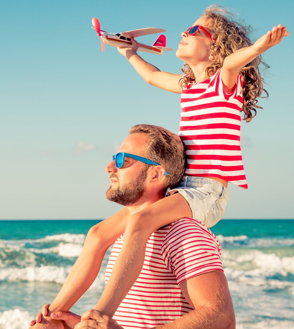 Dad and daughter on beach